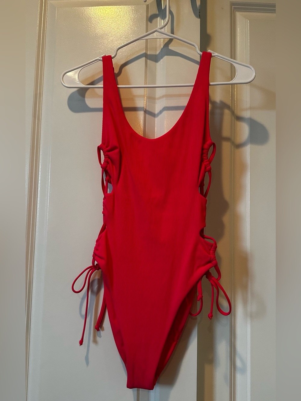 Summerful pink/coral ribbed One-Piece Swimsuit with Side Tie Details